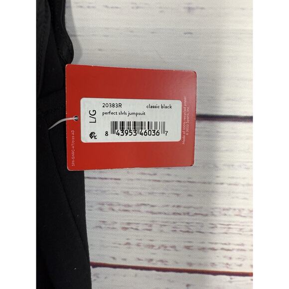 Spanx The Perfect Sleeveless Jumpsuit Women's Size L Black Ponte Flare NWT - Picture 4 of 9